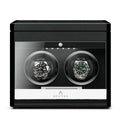 Aevitas 2 watch winder in carbon fibre finish with clear display and two rotating watches.