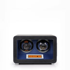 Aevitas 2-watch winder in black leather with blue interior, digital controls, and two automatic watches on display.