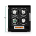 Aevitas 4 watch winder in piano black wood with glass door, black leather interior, and touchscreen.