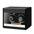 Aevitas 2 watch winder in carbon fibre finish with two watches and extra storage.