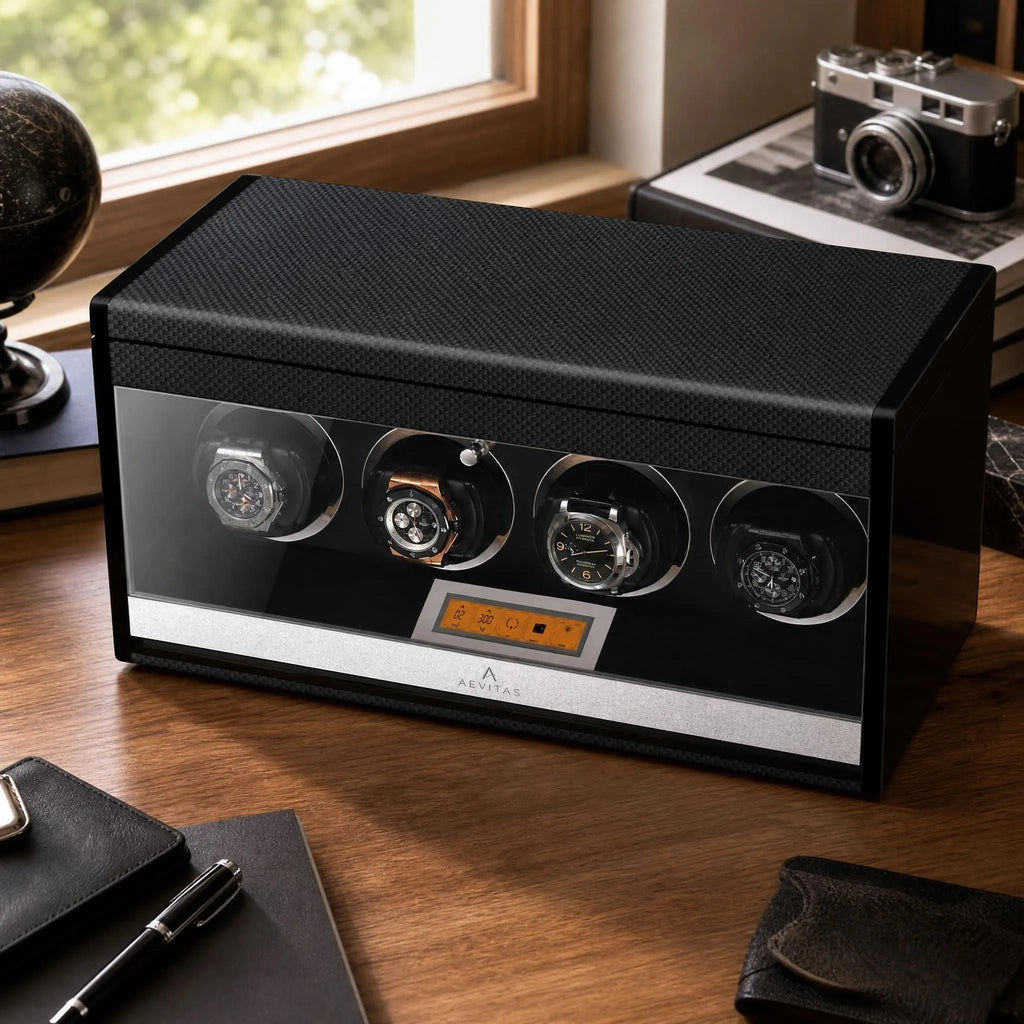 Close-up of 4 Watch Winder in carbon fibre with satin chrome parts, showing textured surface and interior LED lighting.