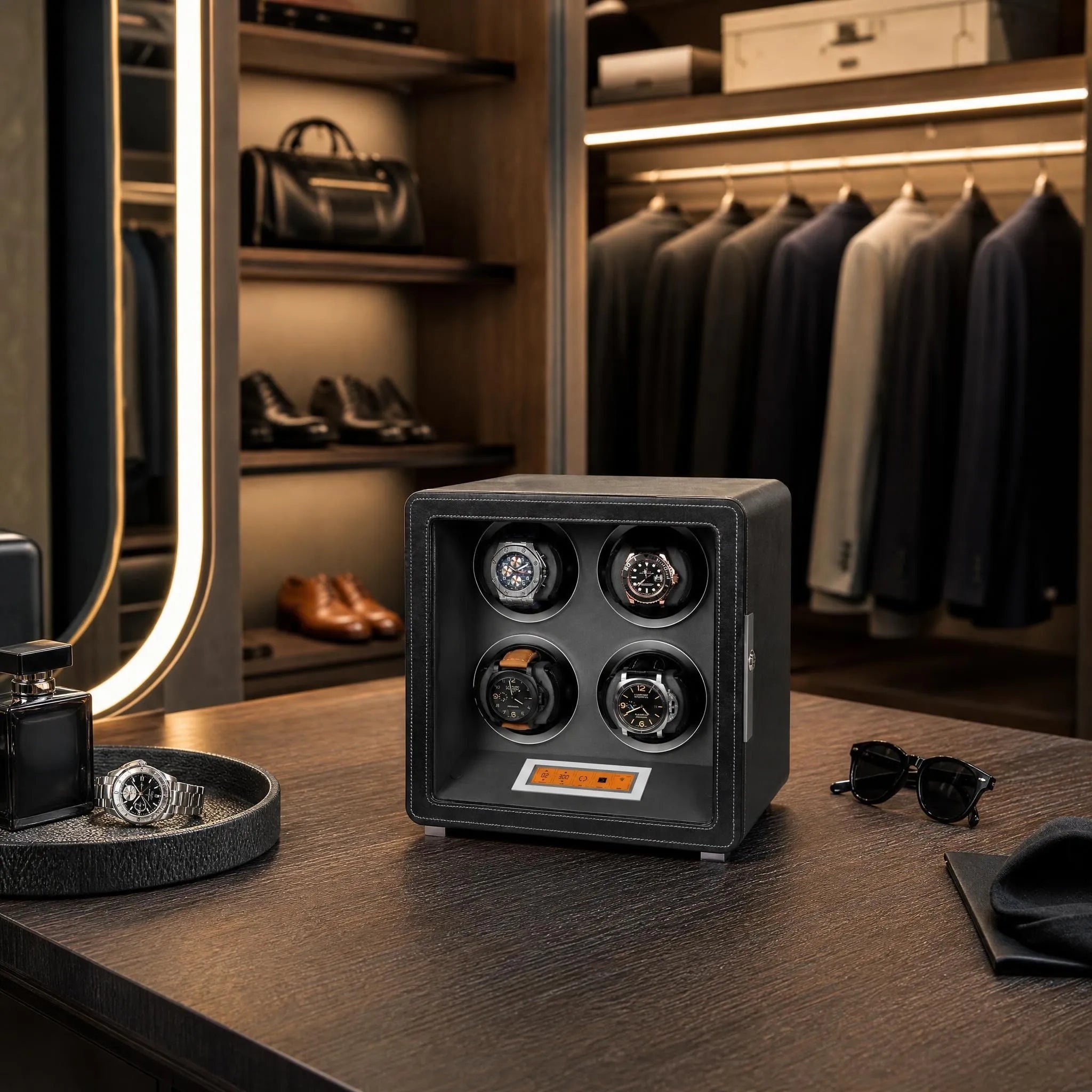 Premium 4 Watch Winder in black and grey leather finish displayed in a modern walk-in dressing room with elegant props.