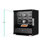 Aevitas 6 watch winder in piano black wood with glass door, touchscreen, and storage drawer.