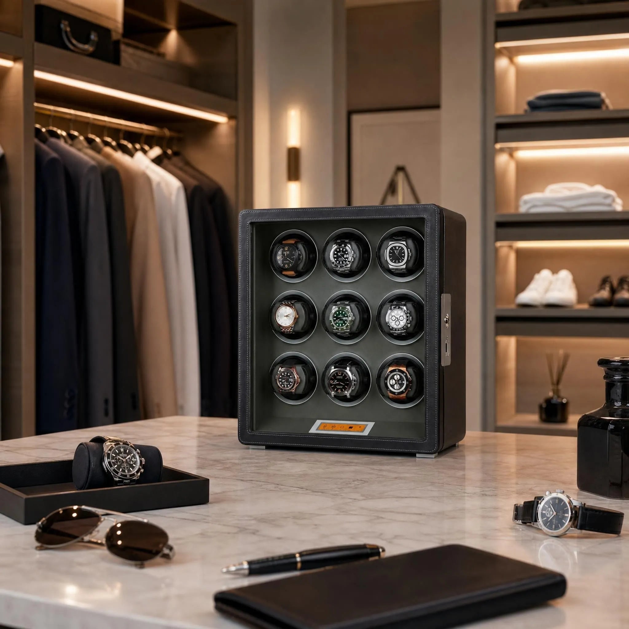 Centered view of black leather 9 watch winder with green interior, surrounded by watches and accessories in a vibrant luxurious dressing room.