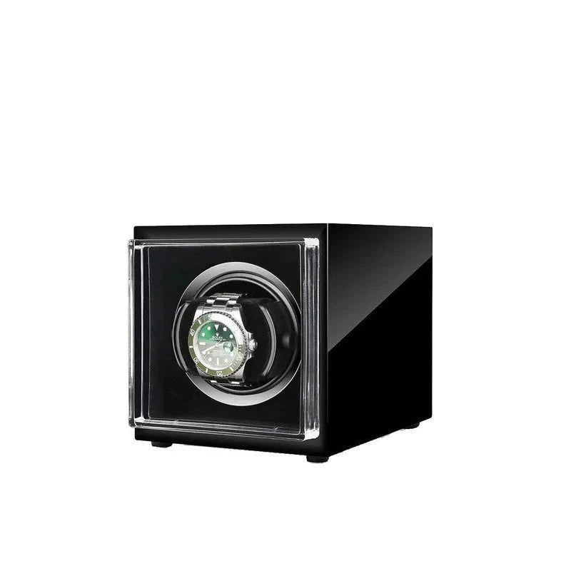 Aevitas single watch winder in high-gloss piano black with a clear front display holding a silver automatic watch.