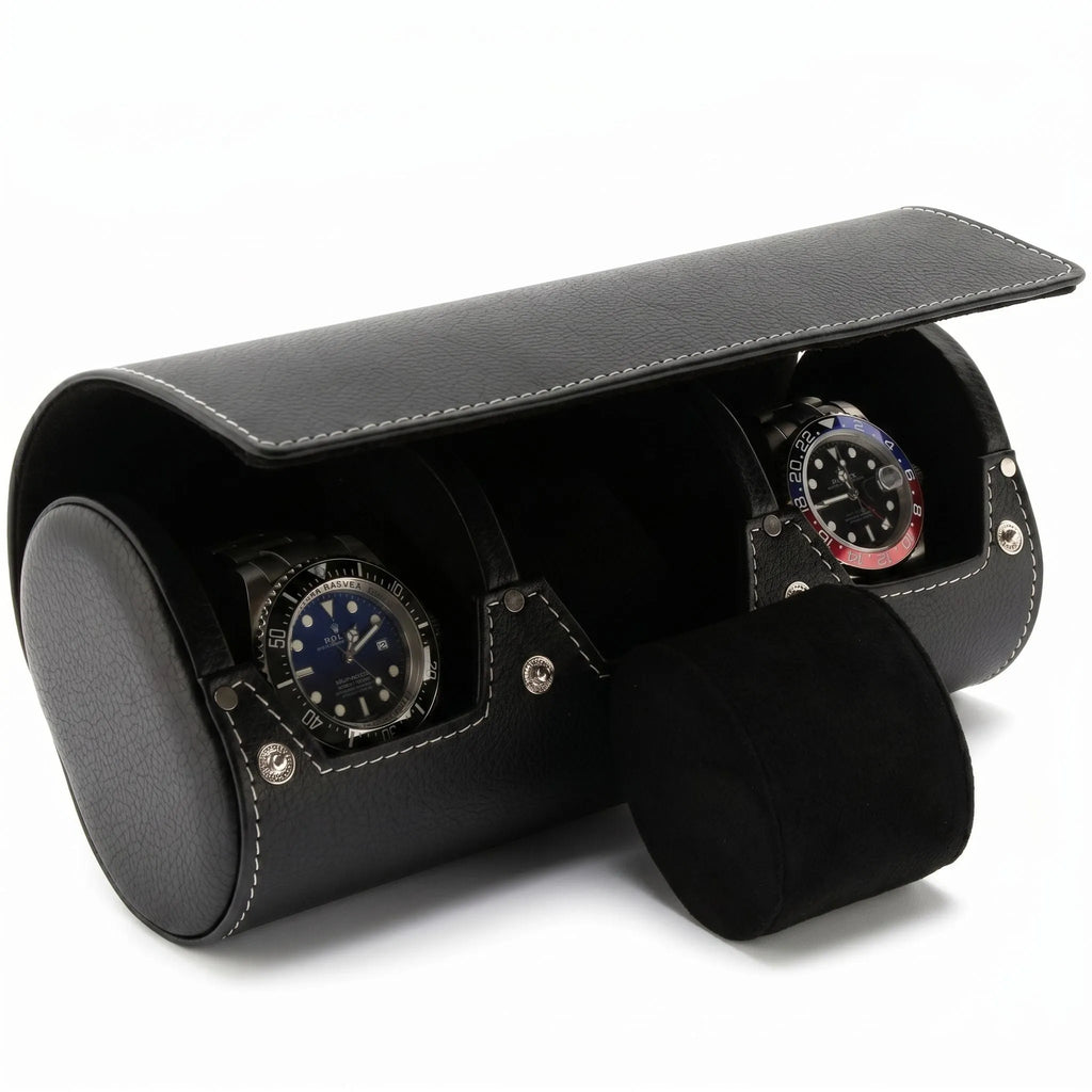 Close-up of black genuine leather triple watch roll with soft lining, showcasing texture and craftsmanship against a neutral background.