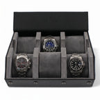 High-resolution image of a black leather watch travel case with grey lining, hexagon design, against a white background with gentle right side light.