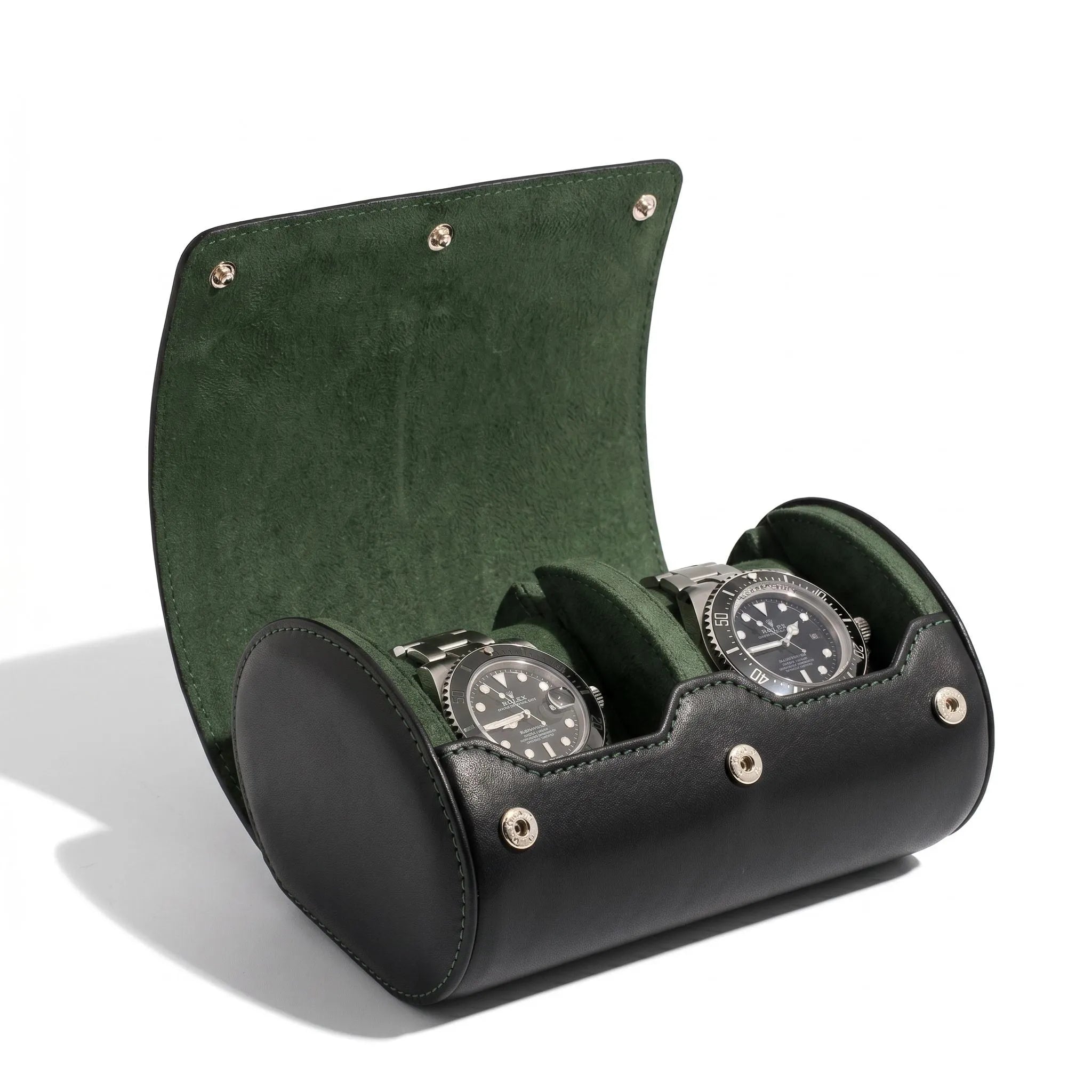 Luxury double watch roll case in black Nappa leather with green Alcantara lining, showcasing craftsmanship and compact travel storage for high-end watches.