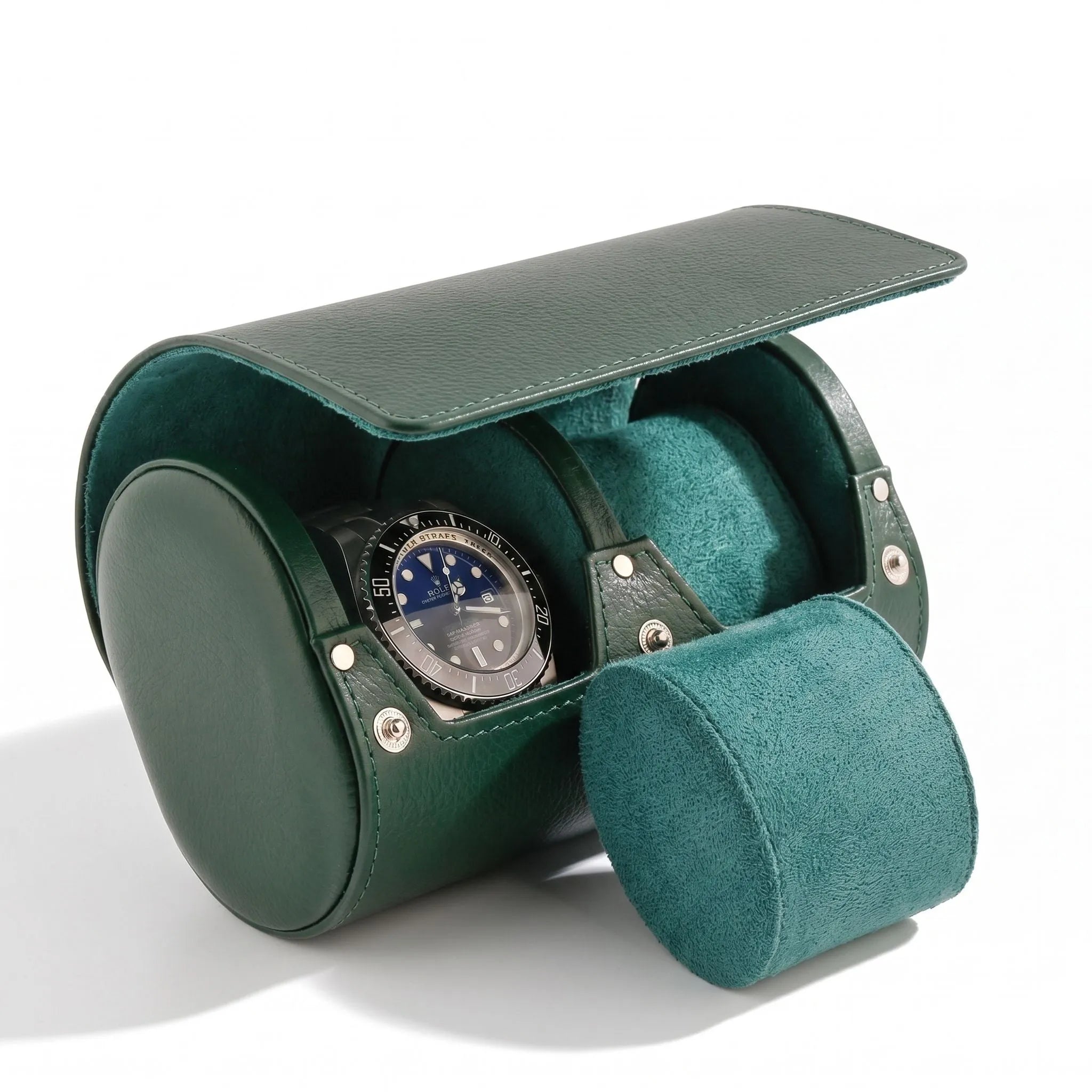 Green leather double watch roll travel case by Aevitas, protects watches during travel with soft lining, in a clean white background with subtle shadow.