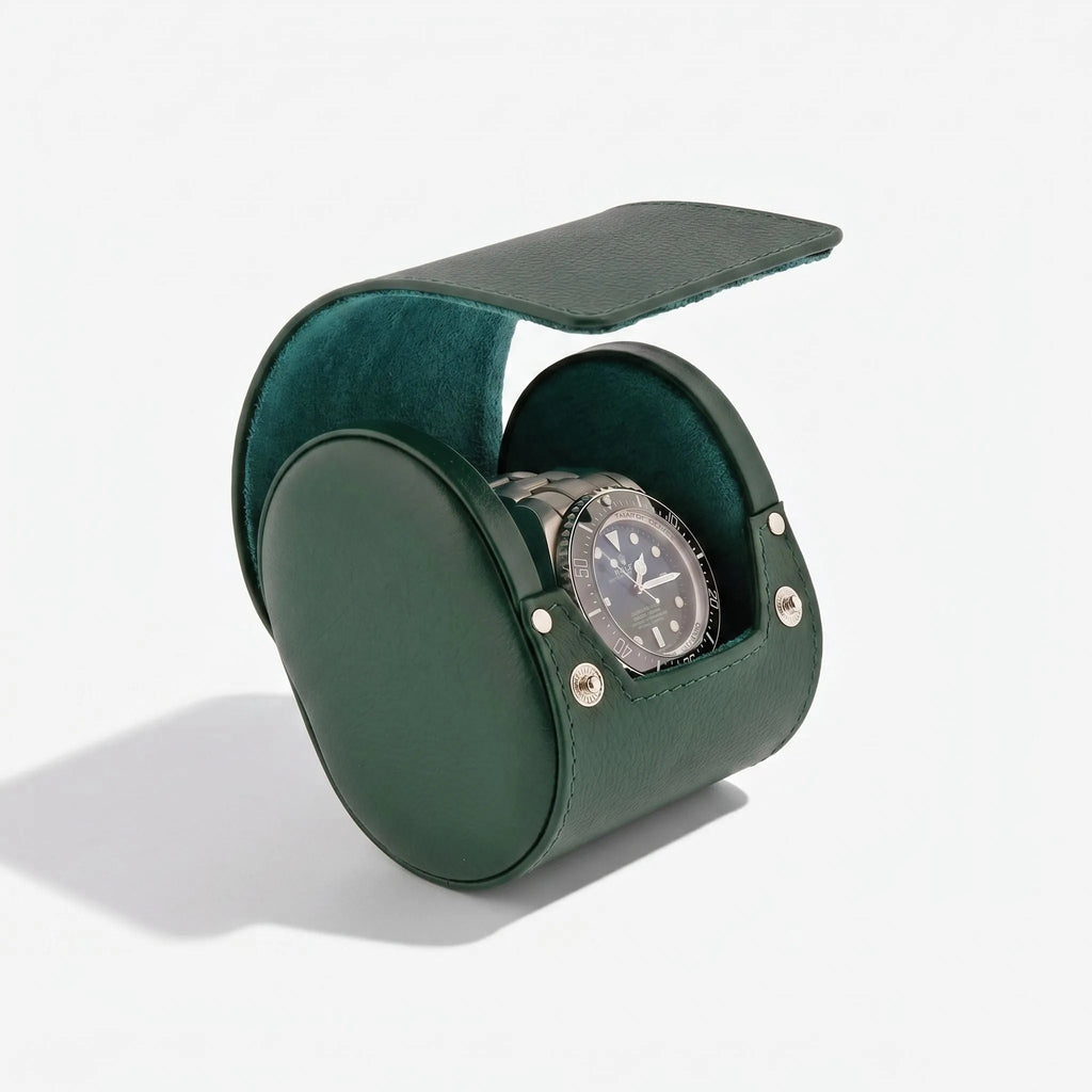 Green genuine leather watch roll travel case by Aevitas, protects watches during travel, with soft lining and elegant logo, showcasing premium quality and craftsmanship.