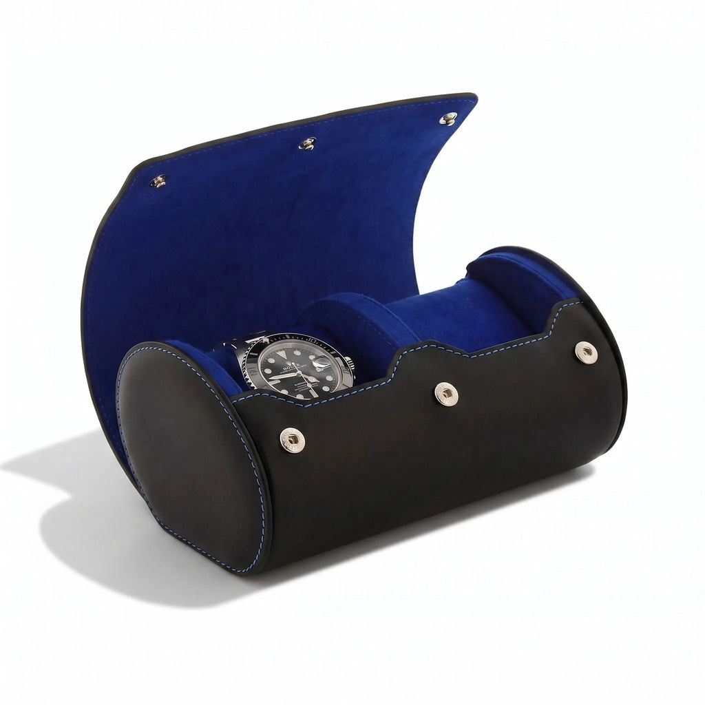Close-up of premium black Nappa leather watch roll with blue lining, showcasing fine stitching and leather texture for luxury watch storage.