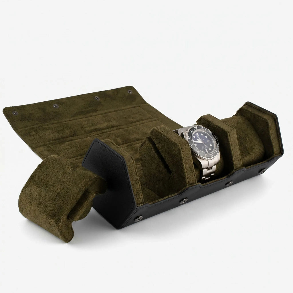 High-quality image of a black Nappa leather hexagon watch roll case with green lining, illuminated to showcase craftsmanship and design.