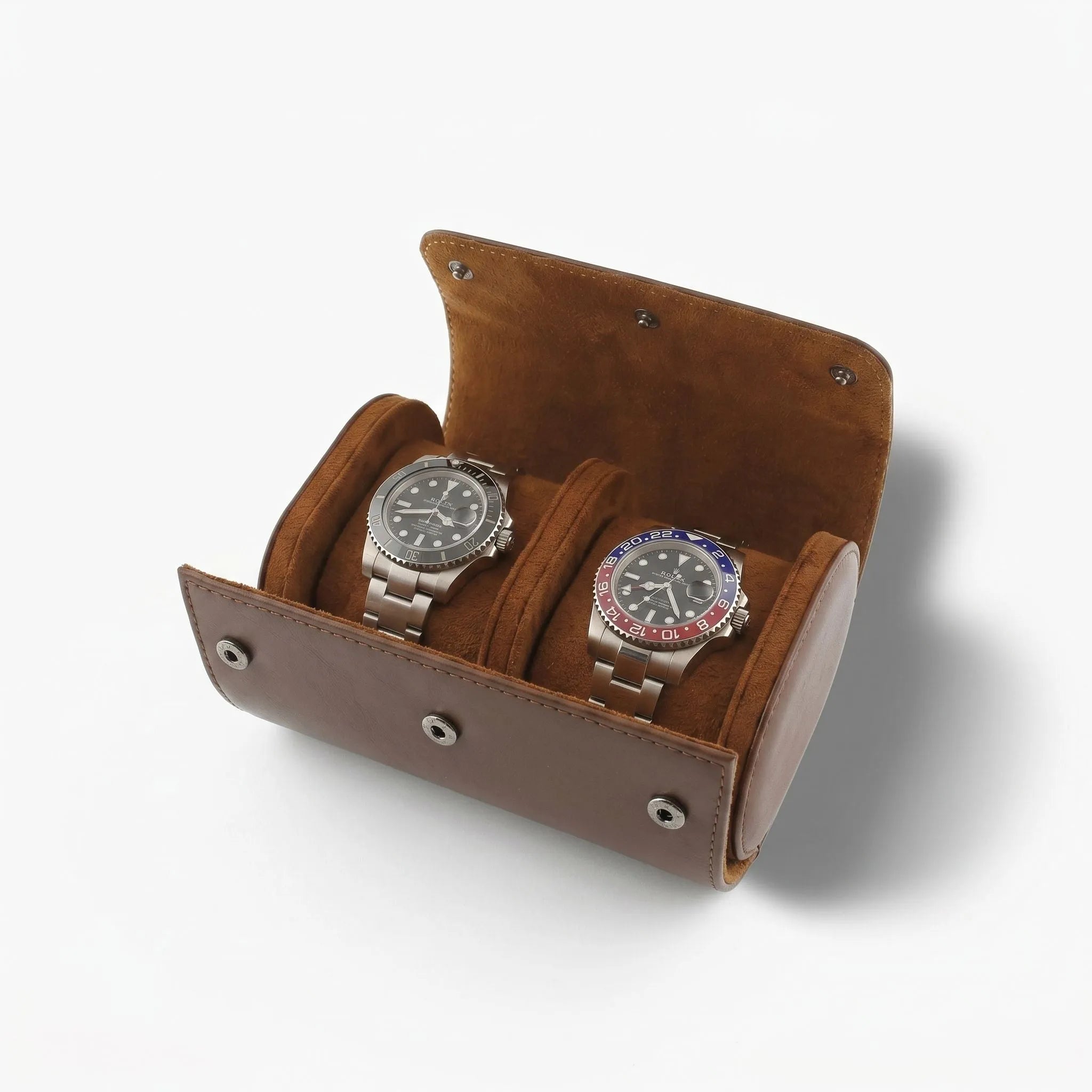 Premium double watch roll in rich brown vegan leather with suede lining, placed on a wooden surface with a shadow on the right for a sleek look.