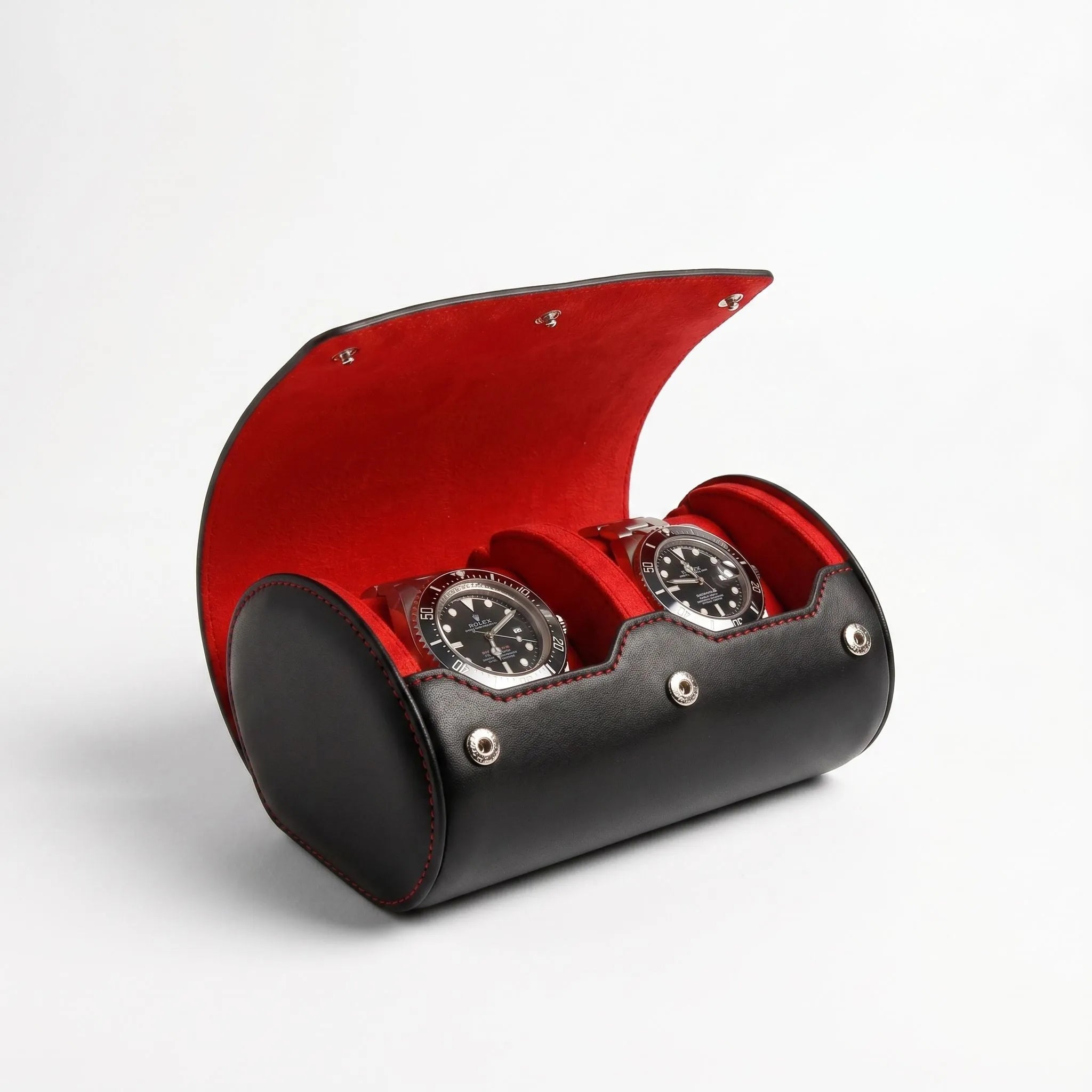 Double Watch Roll Case in black nappa leather with red lining, ideal for luxury watch travel storage.
