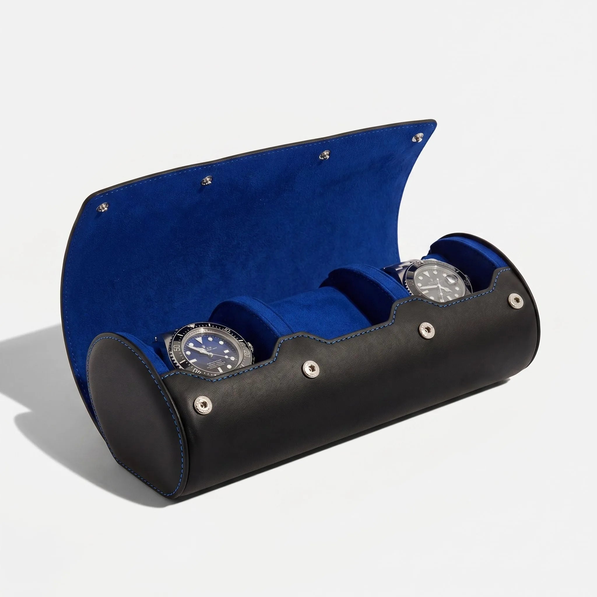 3 watch roll case in black Nappa leather with blue lining, showcasing its compact design and premium craftsmanship suitable for travel storage of luxury watches.
