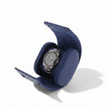 Blue vegan leather single watch roll with soft suede lining, designed for safe travel and stylish storage.